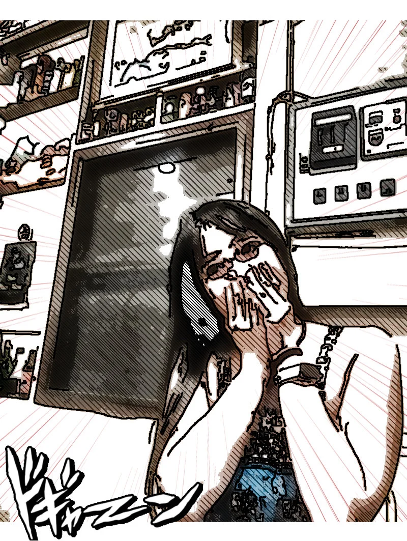 A desk of manga polaroids, shot from the phone.